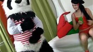 Sexy brunette girl in red tempts Panda - porn video