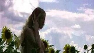 Alena posing between sunflowers - porn video
