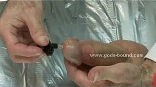 Strong hunk tied near cage gets spanked - porn video